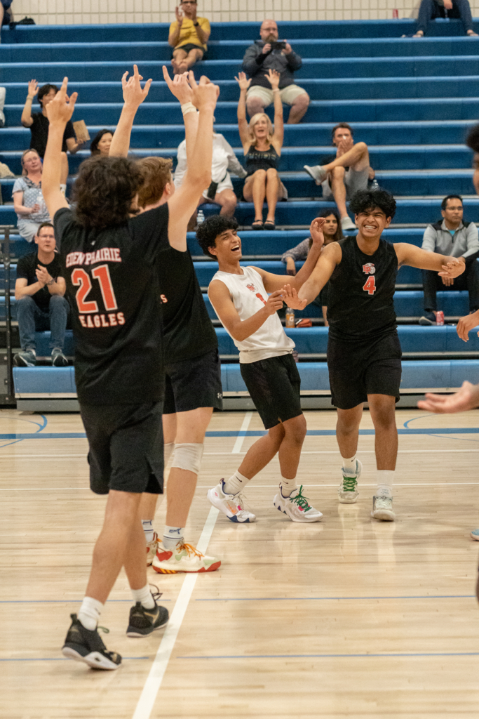 Deion Lange (21), libero G Padmanaban (in white jersey) and hitter Shaurya Gumma (4) 6-7-23