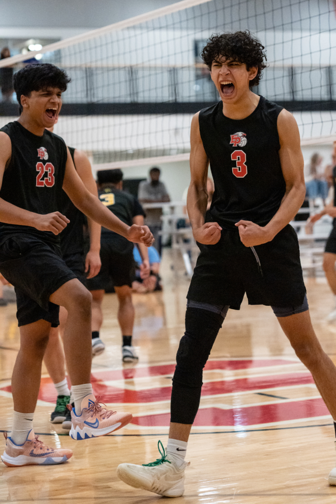 Junior hitter Aadi Awasthi (3) and senior setter Buven Padmanaban (23) boys volleyball May 2023